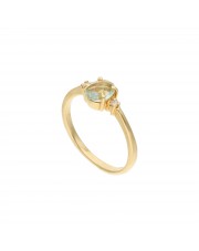 Złoty pierścionek z jasnobłękitną cyrkonią